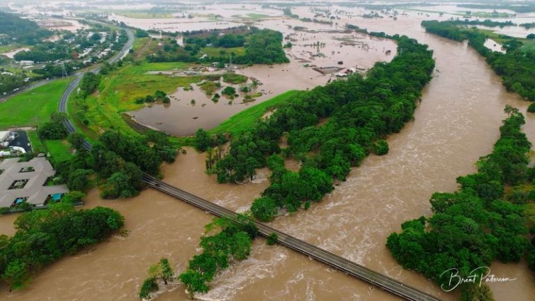 One dead, thousands evacuated as northeast Australia battles massive floods