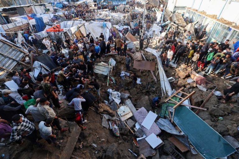 Israeli airstrike on central Gaza school compound housing displaced people kills 22, as military operation intensifies